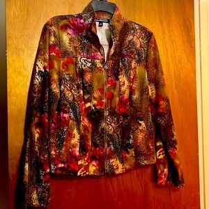 In good condition size medium zip up colorful jacket